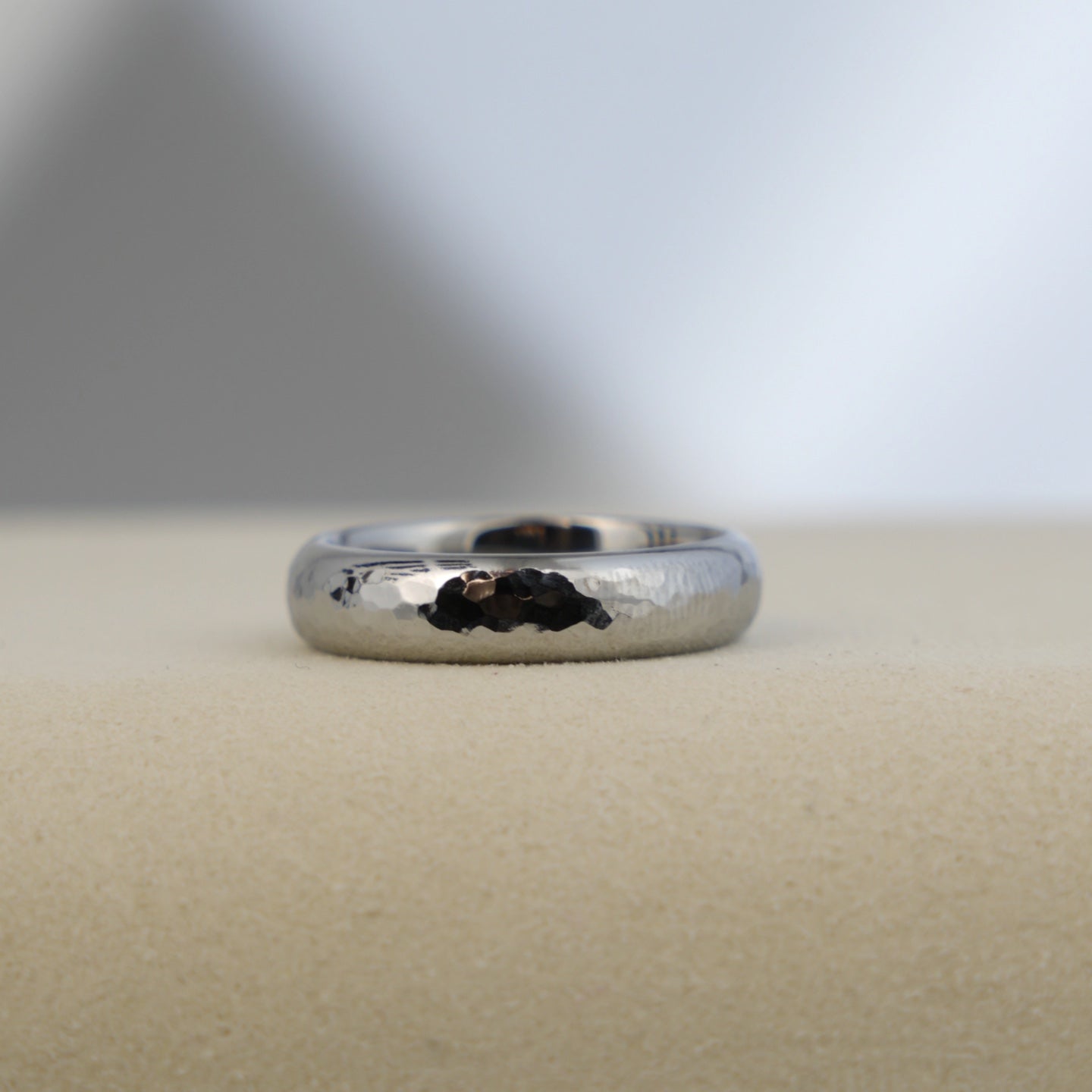 The Rhenium Ring: The Fingerprint of the Forge on Element 75.A Hand-Hammered, Custom-Forged Band of Scientific Artistry.