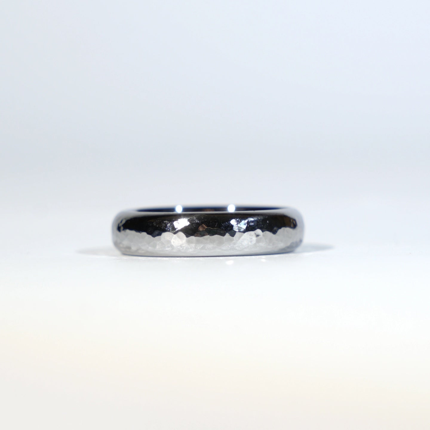 The Rhenium Ring: The Fingerprint of the Forge on Element 75.A Hand-Hammered, Custom-Forged Band of Scientific Artistry.